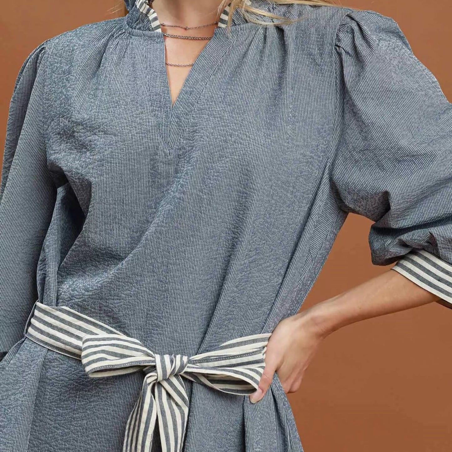 Chic everyday outfit styling with a denim contrast trim tie waist mini dress from Solazura Boutique
