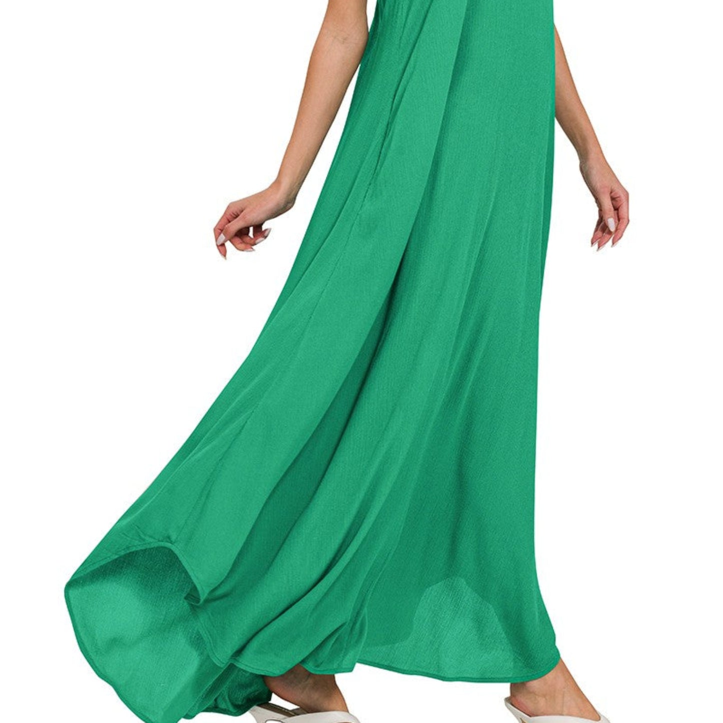 Human lifestyle photo of the Zenana K green dress being worn in a bright, natural coastal setting.