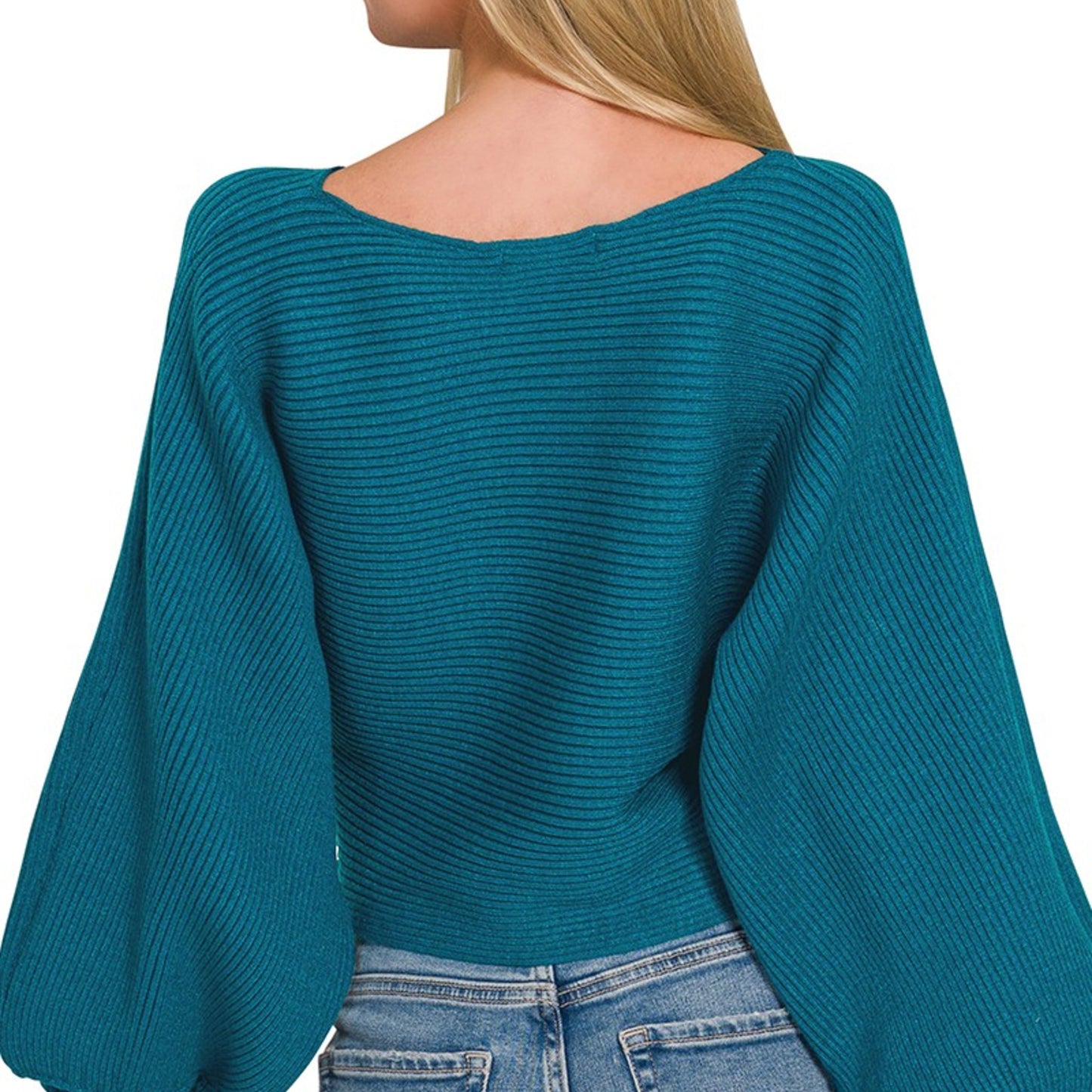Back view of the Ocean Teal ribbed sweater showing the relaxed dolman fit.