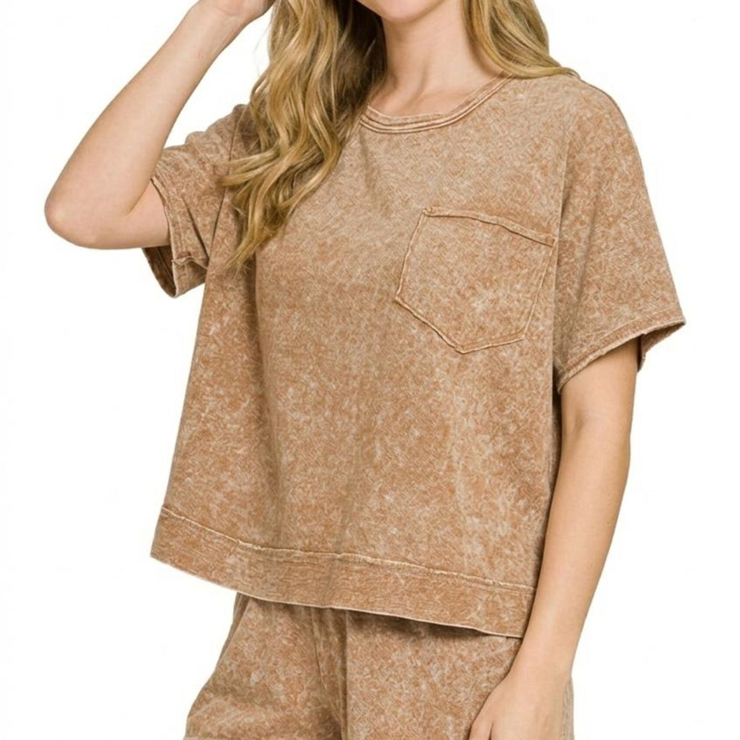 Lifestyle view of the brown boxy top and shorts set showing the relaxed boutique fit.