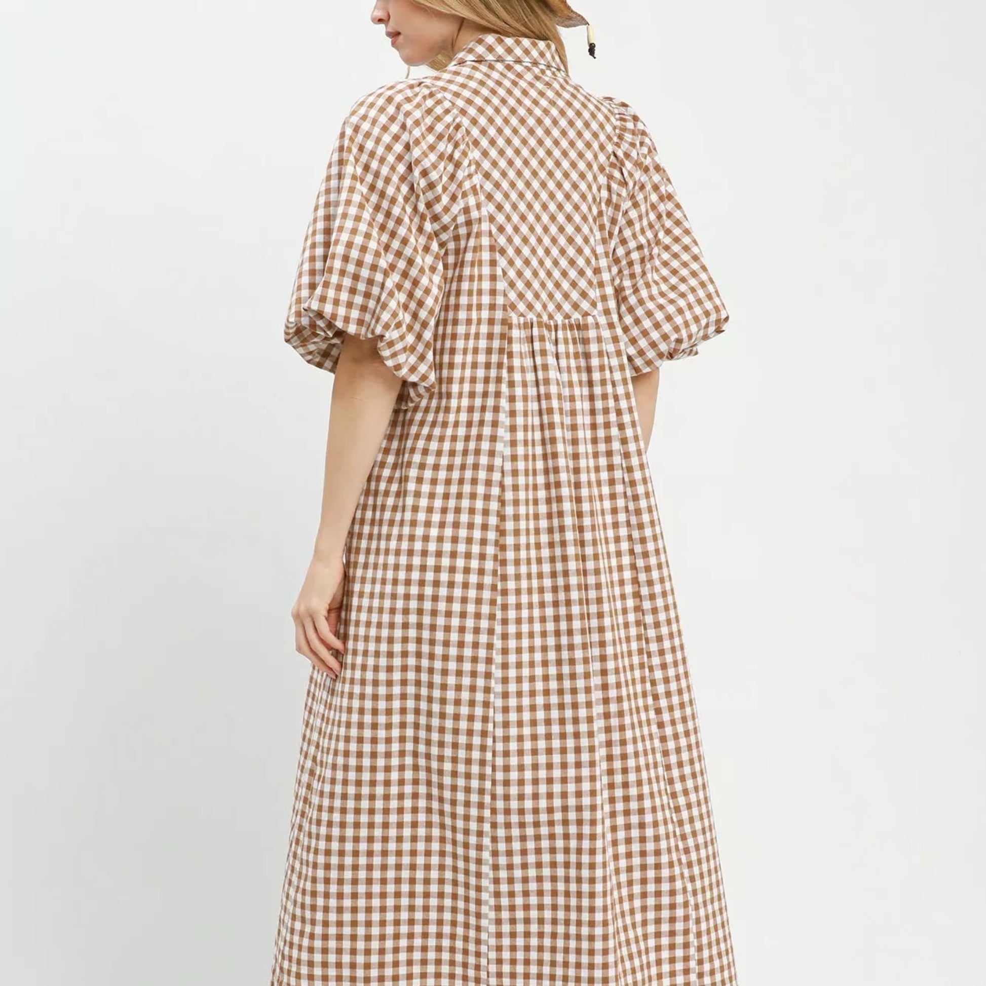 Back view of the brown plaid puff sleeve midi dress showing rear bodice fit from Solazura Boutique