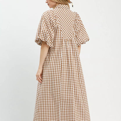 Back view of the brown plaid puff sleeve midi dress showing rear bodice fit from Solazura Boutique