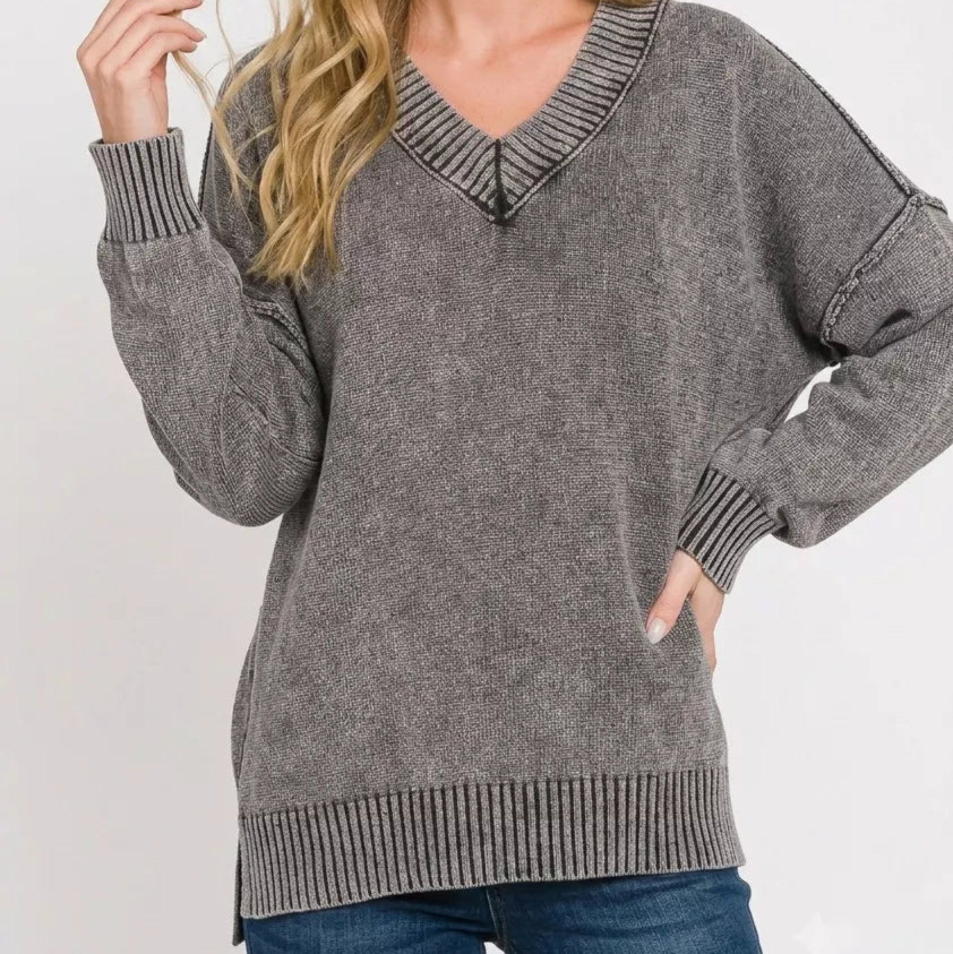 Casual slouchy streetwear outfit styling with an oversized Zenana deep V-neck sweater from Solazura Boutique