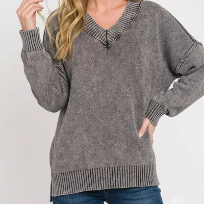 Casual slouchy streetwear outfit styling with an oversized Zenana deep V-neck sweater from Solazura Boutique