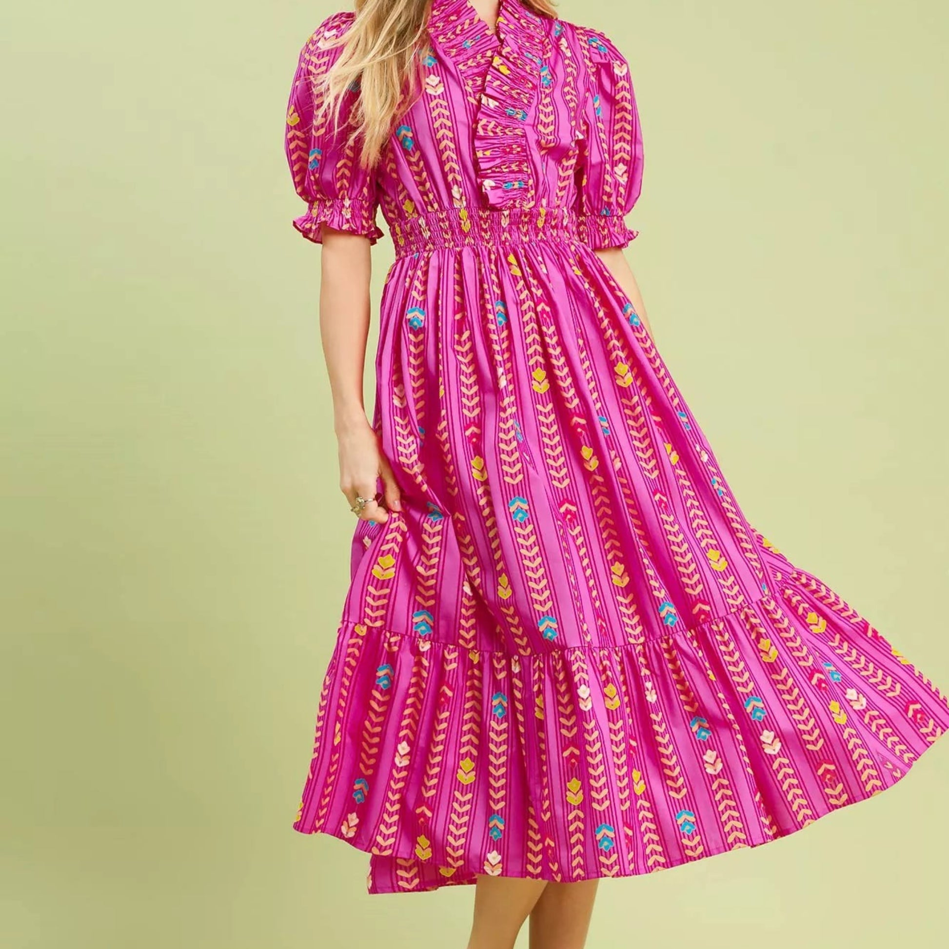 Chic summer vacation or garden party outfit styling with a pink smocked midi dress from Solazura Boutique
