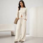 2 piece women's striped pants set in beige with button front cardigan and wide leg pants