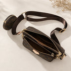 Open view of the brown 3-piece convertible crossbody handbag showing spacious zippered compartments and adjustable strap.