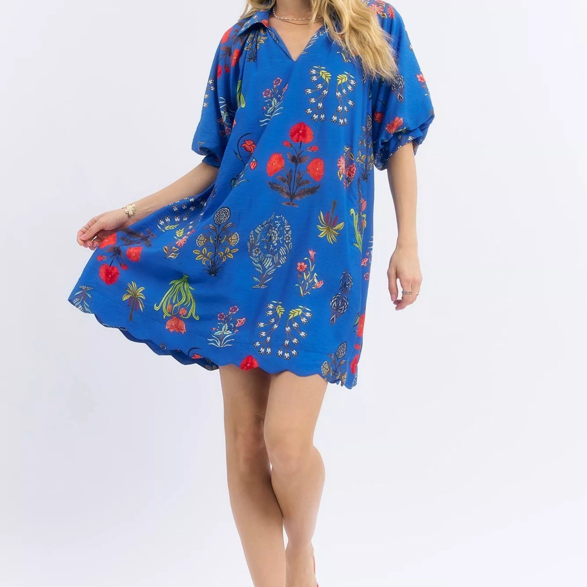 Chic spring or summer resort outfit styling with an Umgee floral encyclopedia mini dress from Solazura Boutique