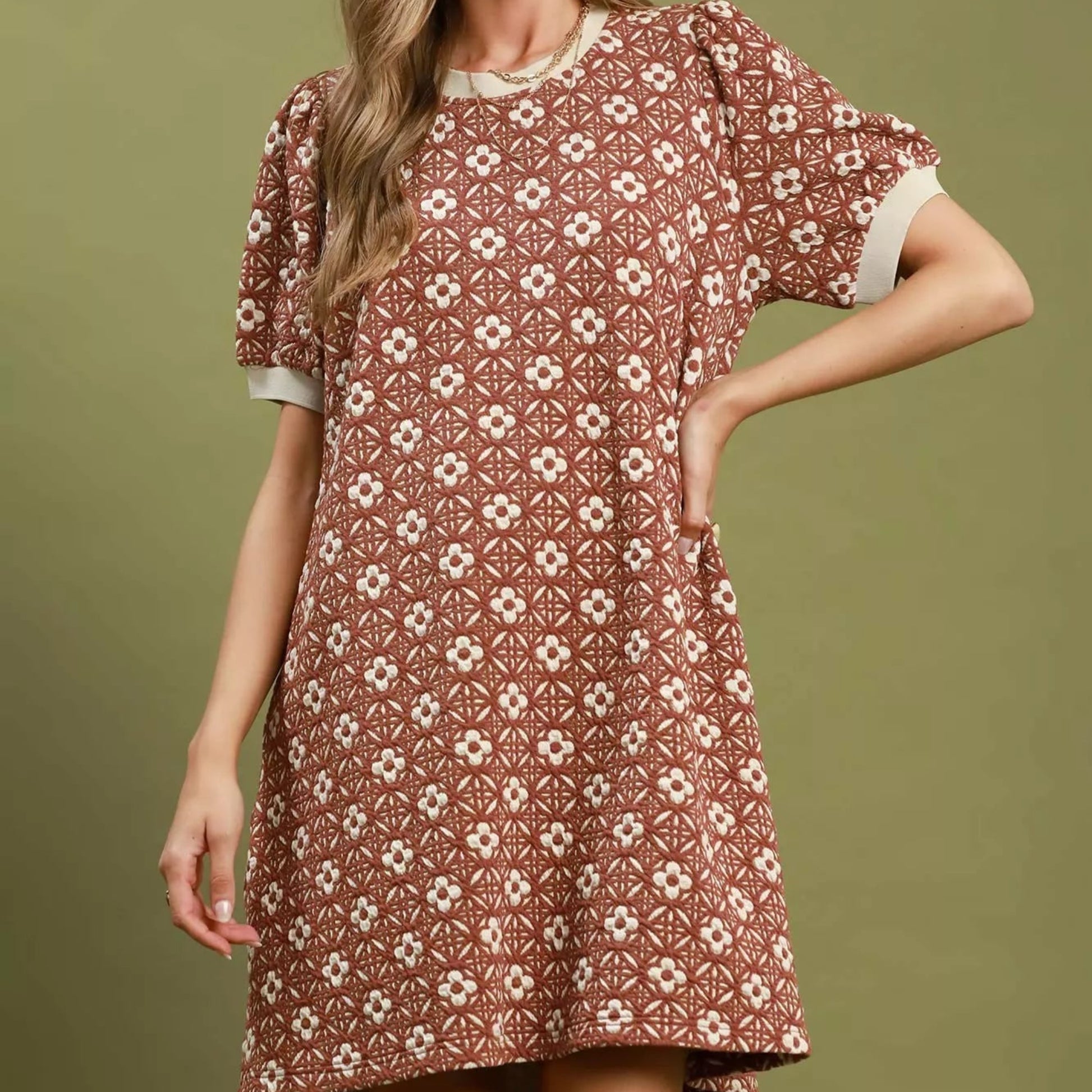 Front view of a casual rust floral Umgee mini dress with romantic puff sleeves from Solazura Boutique