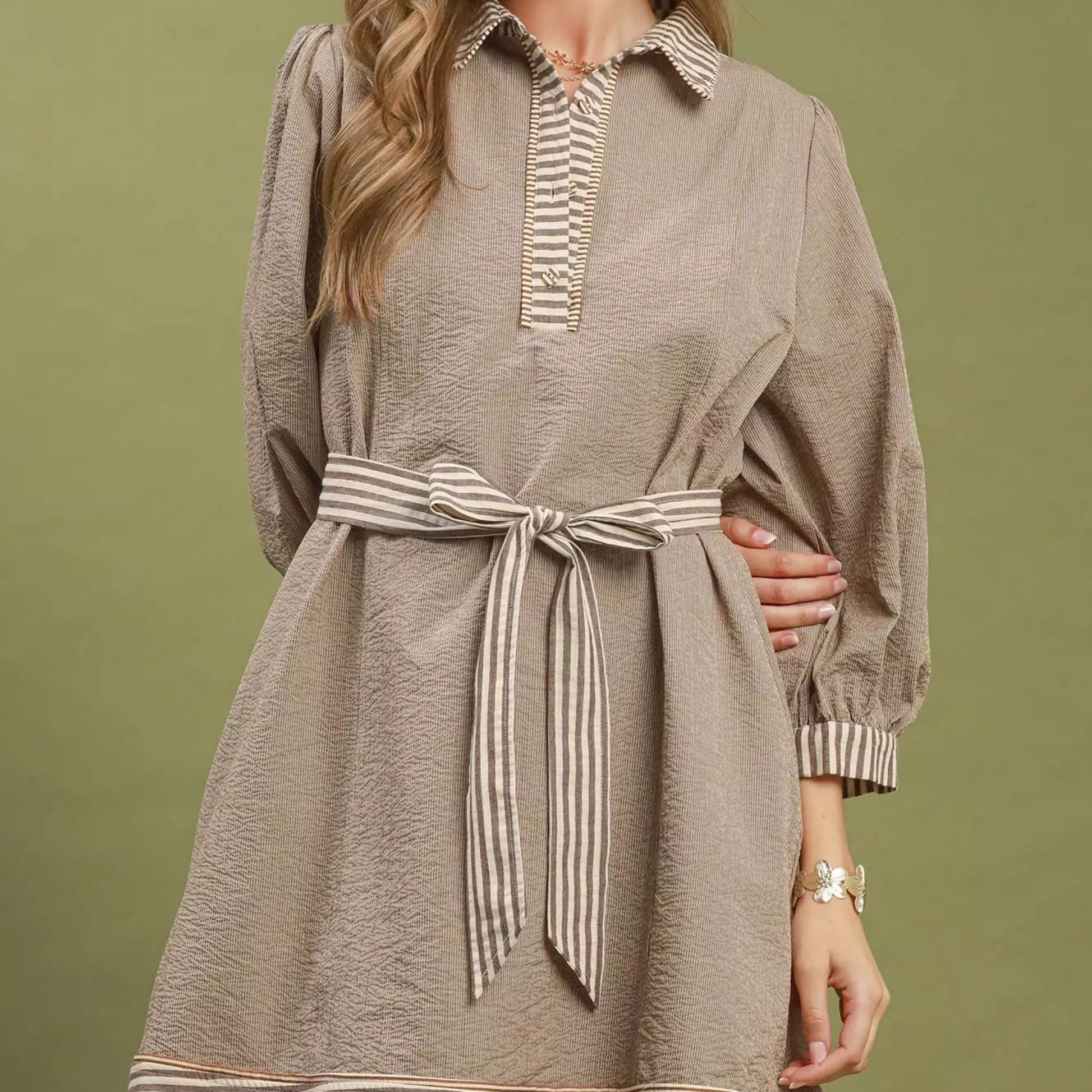 Front view of a casual brown striped Umgee mini dress with romantic puff sleeves from Solazura Boutique
