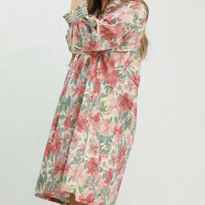 Close up detail of the stretchy smocked wrist cuffs on an Umgee mixed floral dress from Solazura Boutique