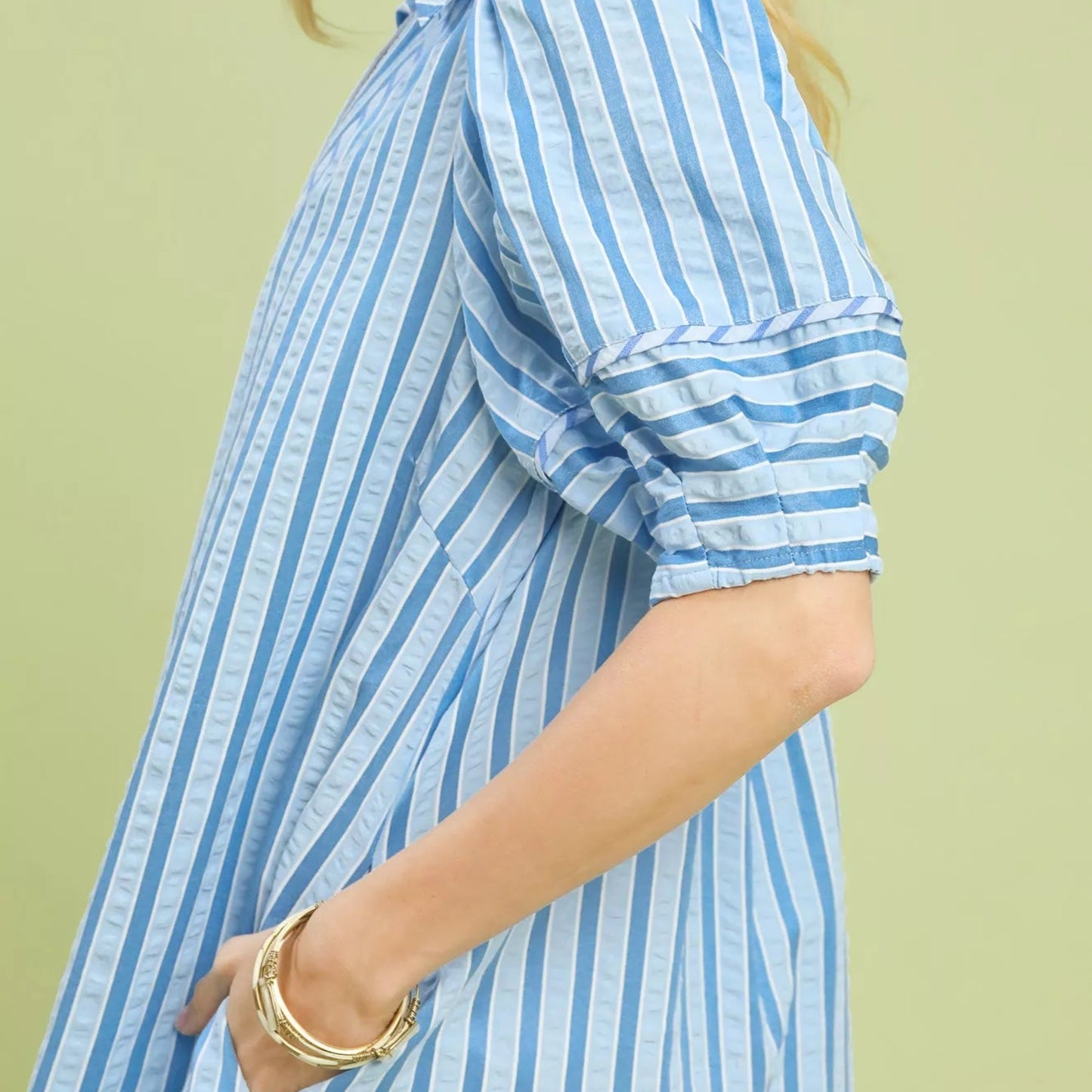Close up detail of the romantic elastic puff sleeve on an Umgee striped dress from Solazura Boutique