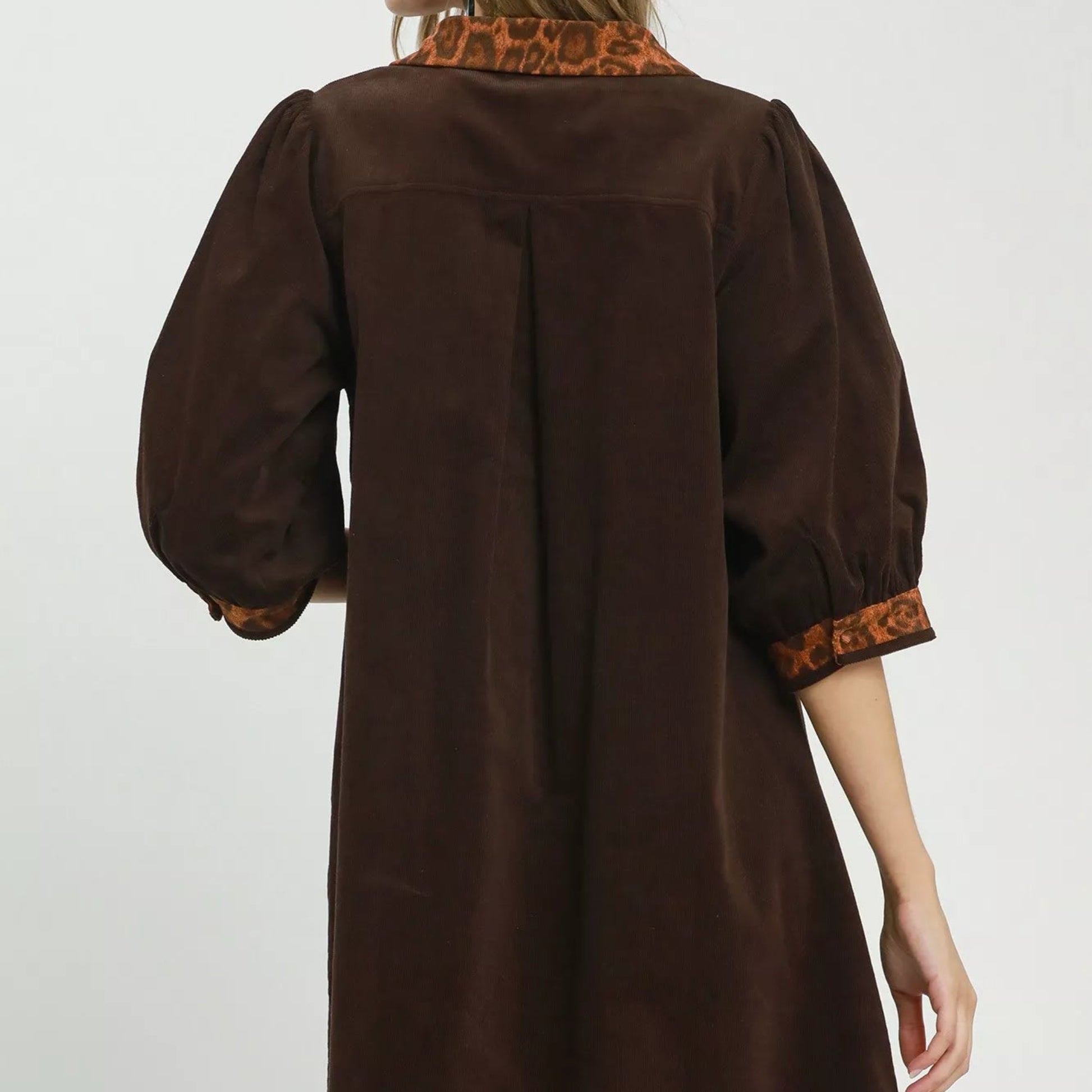 Back view of the breezy unlined Umgee V-neck shift dress from Solazura Boutique
