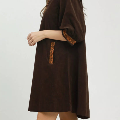 Model wearing a comfortable relaxed fit Umgee casual everyday dress from Solazura Boutique