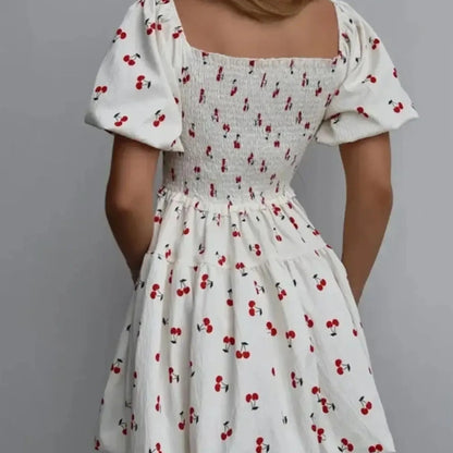 Puff Sleeve Cherry Print Smocked Mini Dress in White - Back View