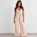 Women’s apricot wrap-front wide-leg jumpsuit with belted waist and sleeveless design