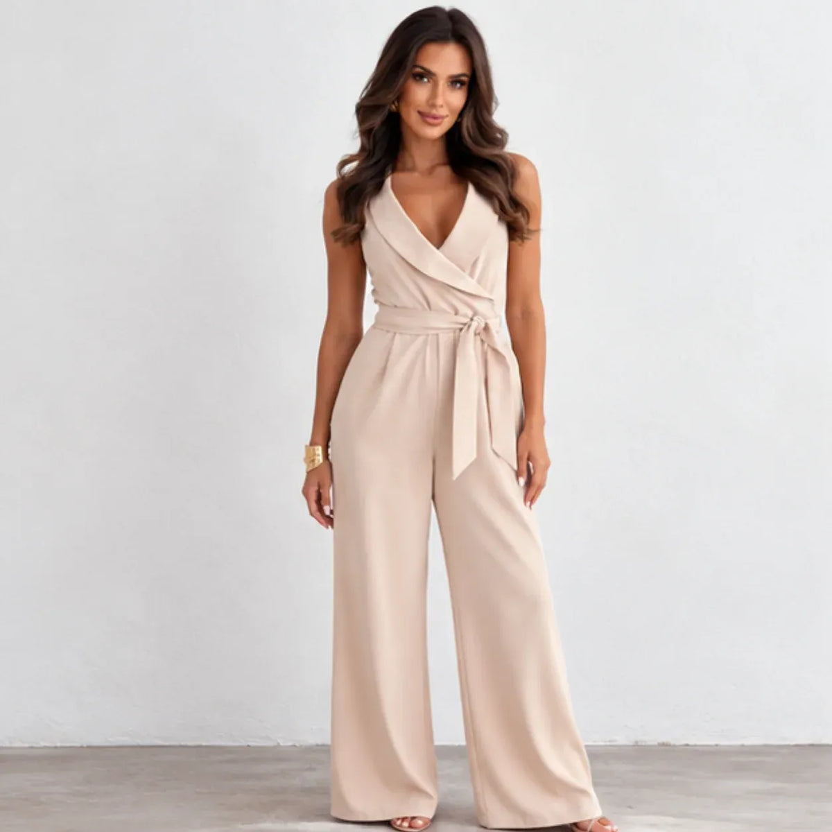 Women’s apricot wrap-front wide-leg jumpsuit with belted waist and sleeveless design