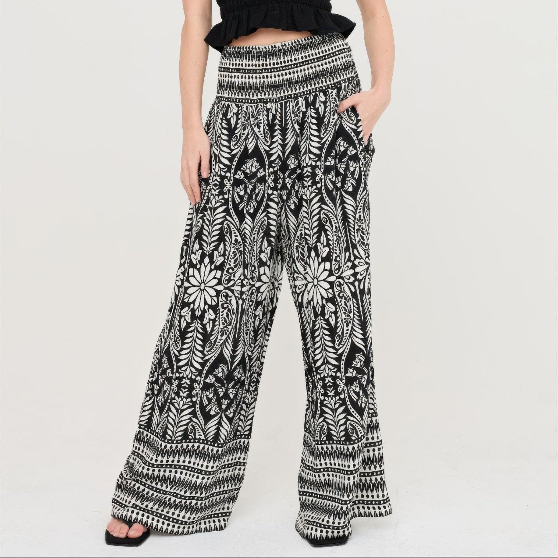 Smocked Waist Floral Pants in Black - Lifestyle View