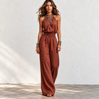 Women’s brown halter wide-leg linen jumpsuit with gathered neckline and relaxed wide-leg fit