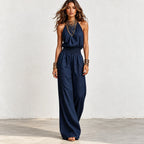 Women’s navy blue halter wide-leg linen jumpsuit with smocked waist and relaxed fit