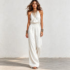 Women’s white halter wide-leg linen jumpsuit with smocked waist and relaxed fit