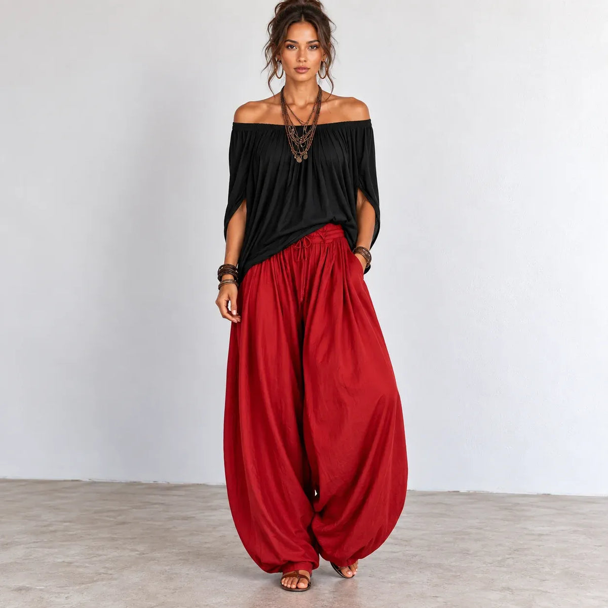 Women’s red and black off-shoulder balloon pants two-piece set with gathered neckline and balloon-style pants