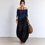 Women’s navy blue and black off-shoulder balloon pants two-piece set with flowing top and balloon pants