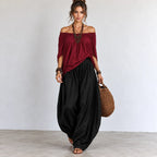 Women’s wine red and black off-shoulder balloon pants two-piece set with flowing top and wide-leg pants