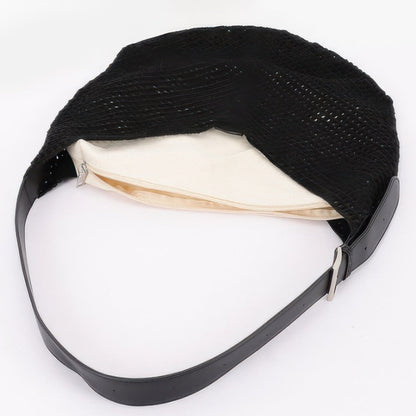 Close up showing the removable inner zipper pouch inside the mesh crochet bag from Solazura Boutique
