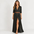Women’s black belted button-front long sleeve maxi dress with pleated details, brown belt, and thigh-high front slit