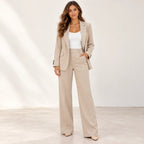 Women’s beige blazer and pants two-piece suit with white top
