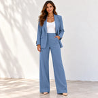 Women’s navy blue blazer and pants two-piece suit with white top