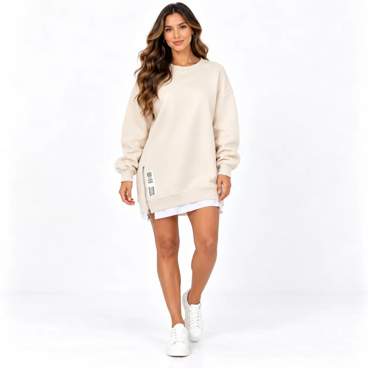 Beige front: Model wearing a beige long sleeve sweater dress with a round neckline and side zipper detail.