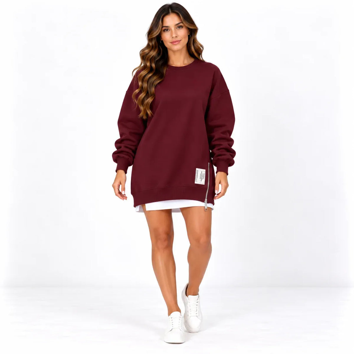 Burgundy front: Model wearing a burgundy sweater dress with long sleeves, a round neckline, and zipper detail near the hem.