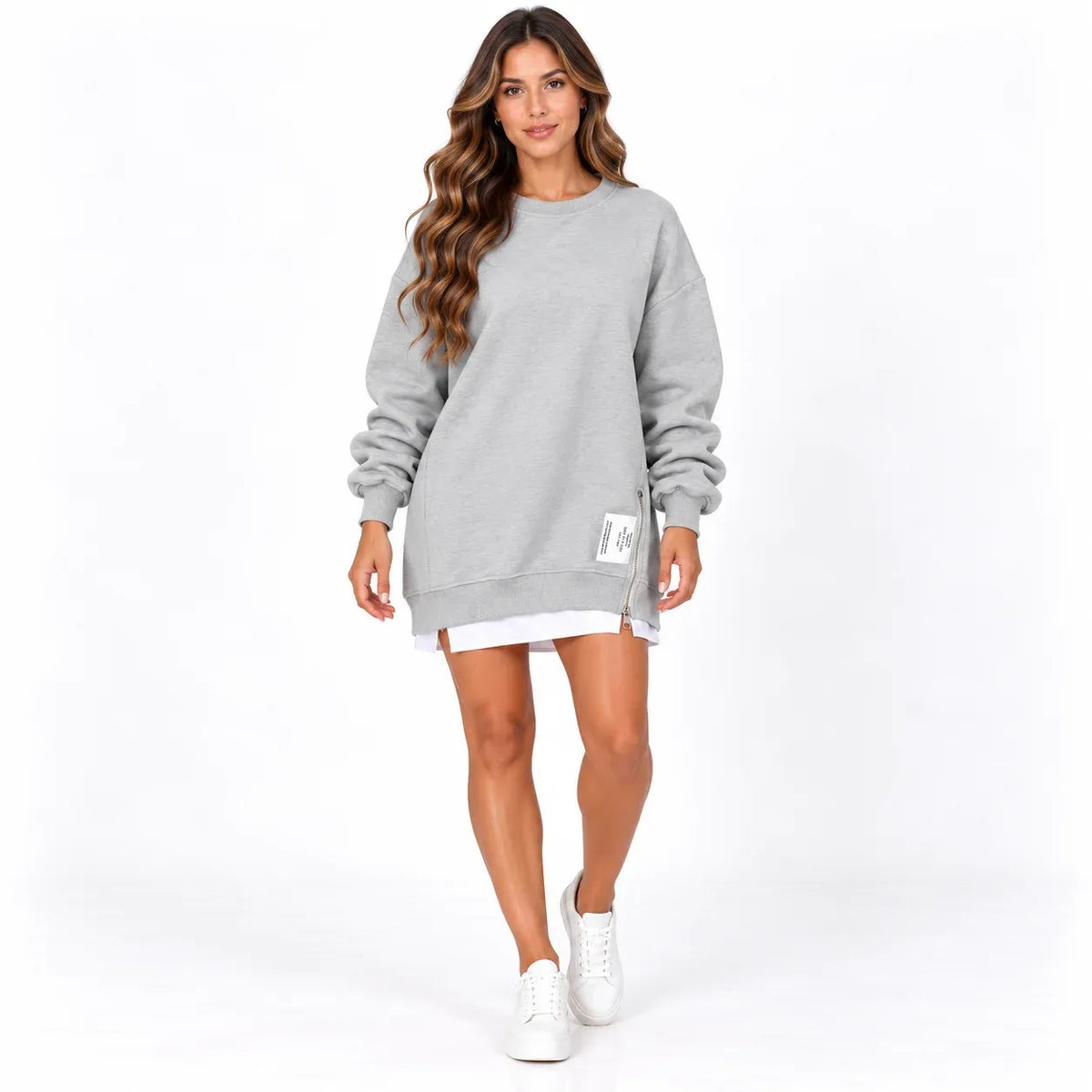 Grey front: Model wearing a grey sweater dress with long sleeves, ribbed trim, and a side zipper.