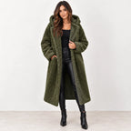 Army green: Women's army green hooded teddy fleece coat with front pockets, worn open over a black top and pants.