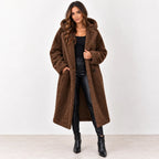 Brown: Women's brown hooded teddy fleece coat showing the long silhouette, front buttons, and hand pocket.