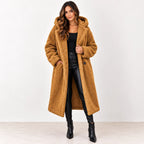 Golden camel: Women's golden camel longline teddy fleece coat showing the hood, textured surface, and front pockets.