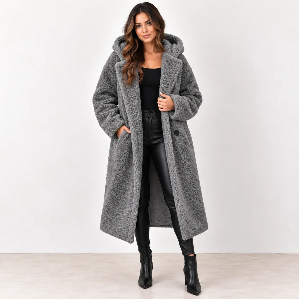 Silver grey: Women's silver-grey hooded teddy fleece coat with wide lapels and dark buttons, front view.