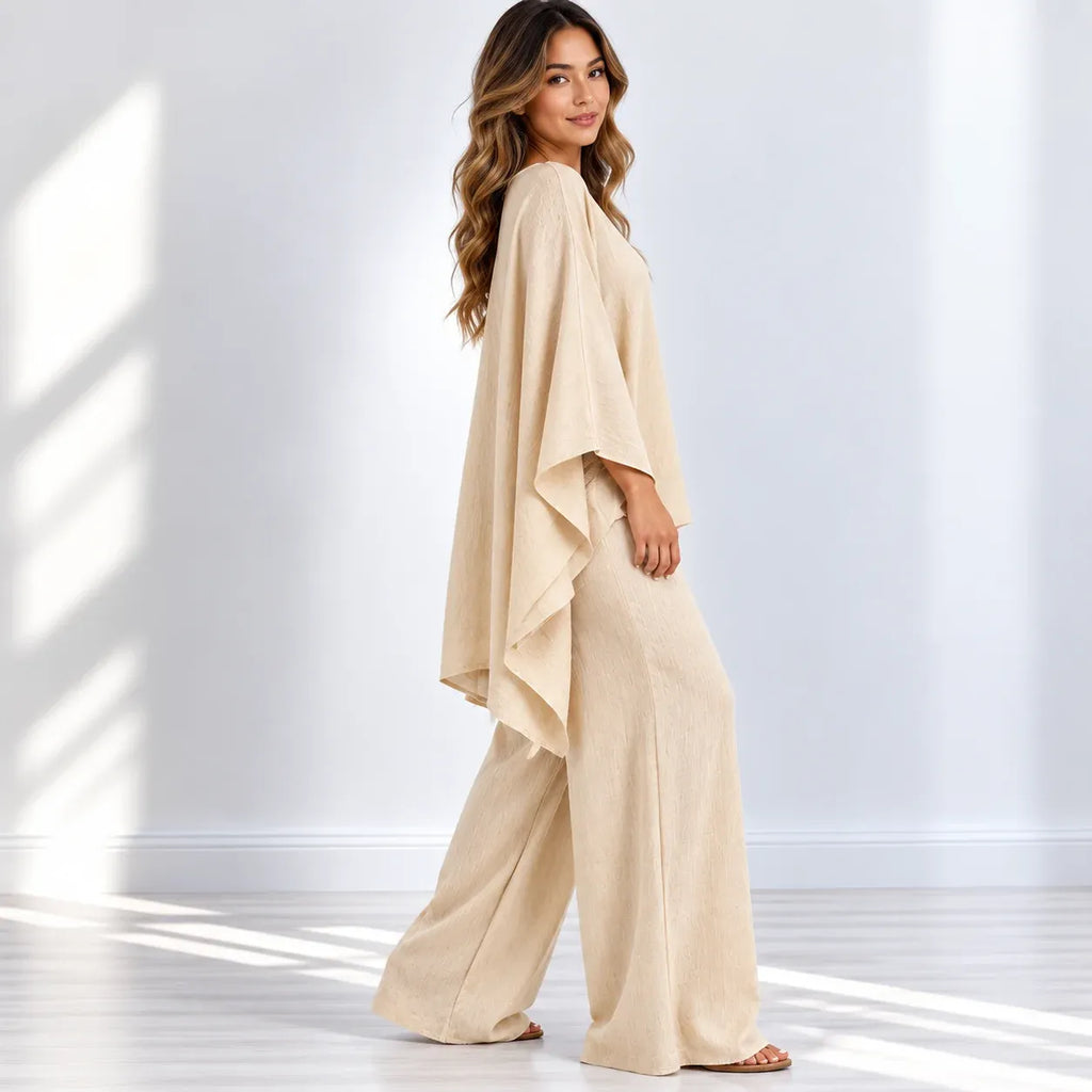Side view of women’s beige loose-fit 2-piece wide-leg pants set with flowy top and wide-leg pants