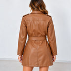 Women’s camel brown mid-length faux leather coat with belted waist, collared neckline, long sleeves, and back view.