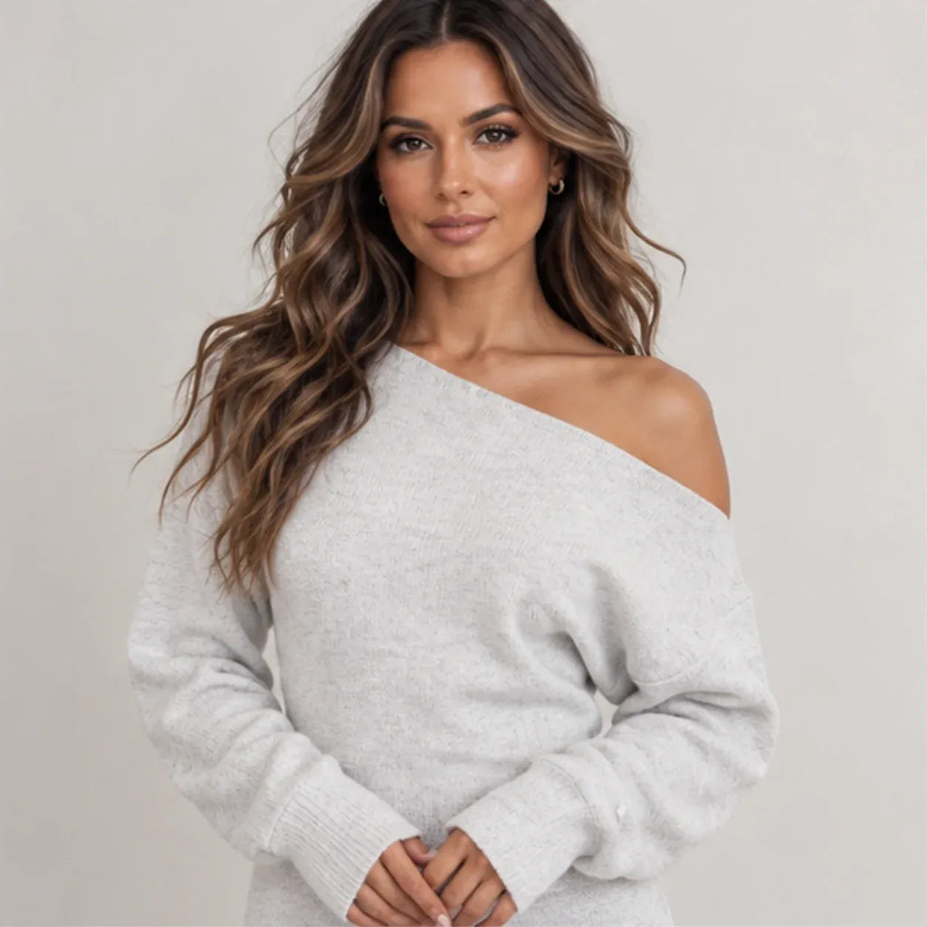 Close-up of women’s light gray off-shoulder knit maxi dress showing the knit texture and neckline