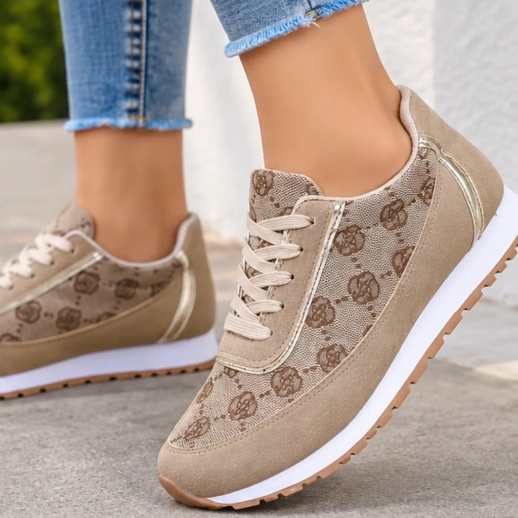 Women’s printed lace-up sneakers in gray with patterned design and metallic side detail, side view