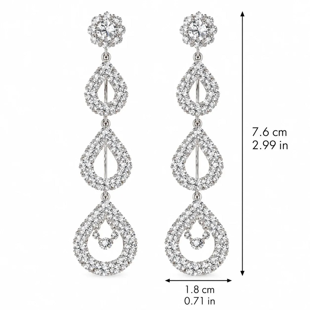 A pair of silver-tone dangle earrings with clear rhinestones, shown with dimension lines indicating a height of 7.6 cm (2.