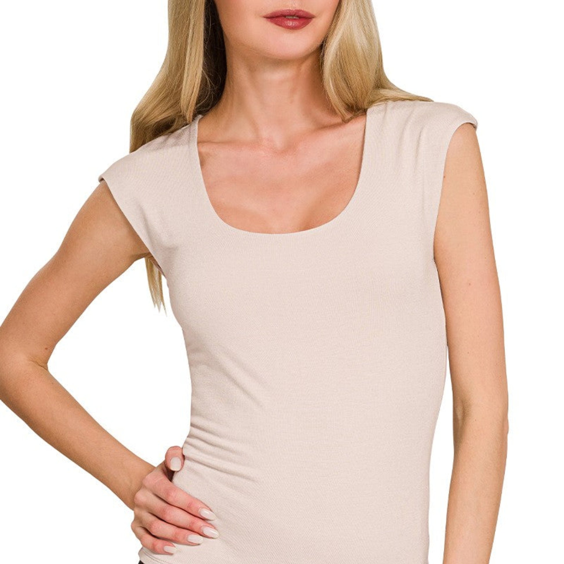 Detailed view of the double-layered design and scoop neckline on the Zenana sand beige tank.