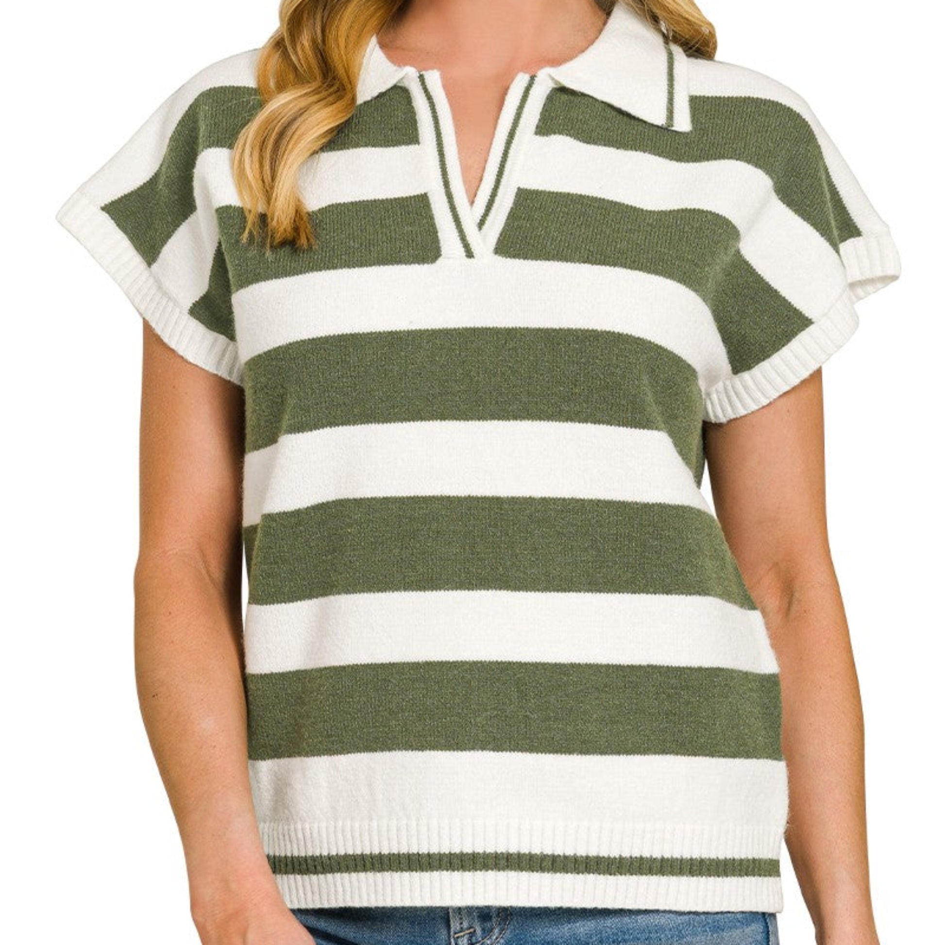 Woman wearing a green and white striped sweater with ruffled sleeves on a white background