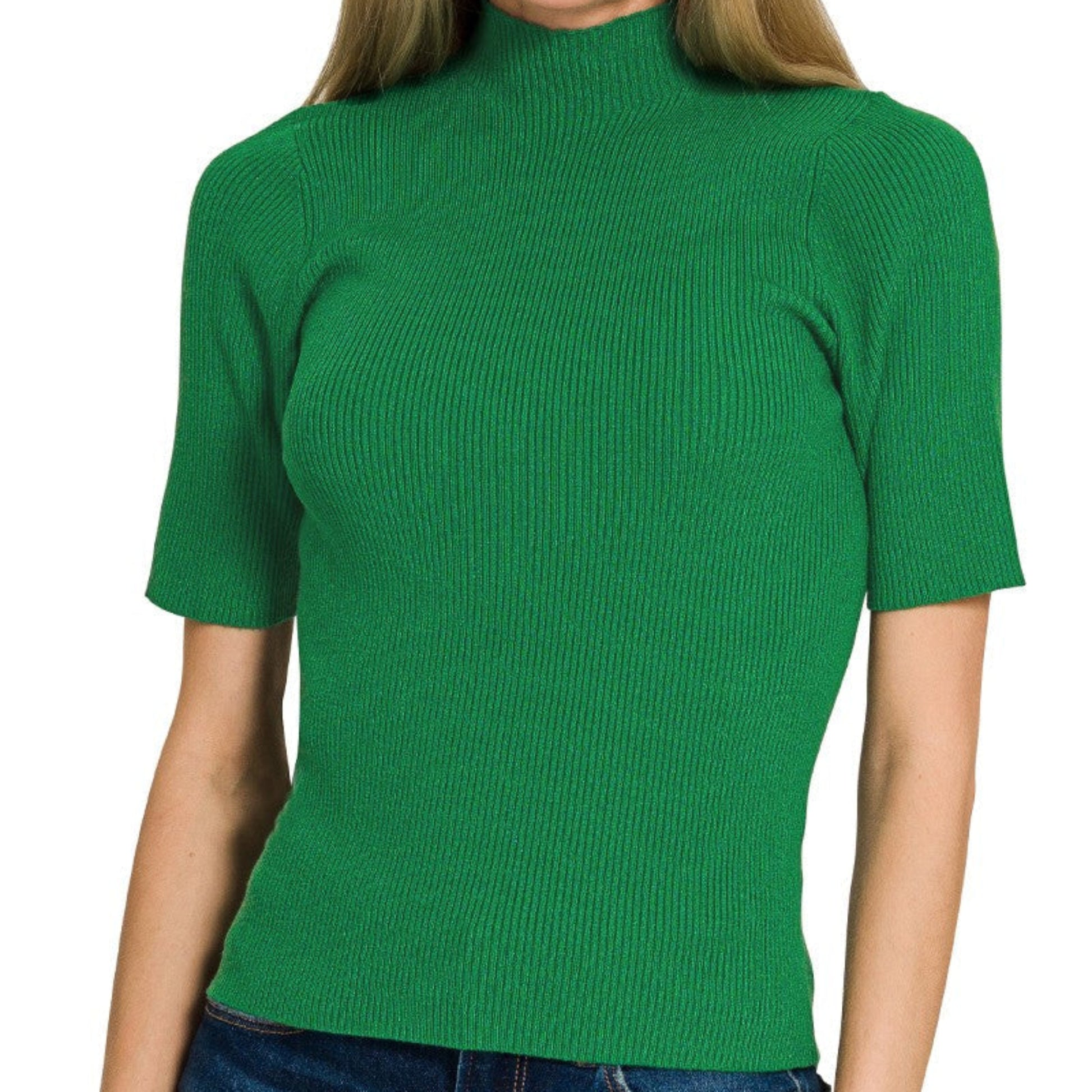 Woman wearing a green ribbed turtleneck sweater on a white background