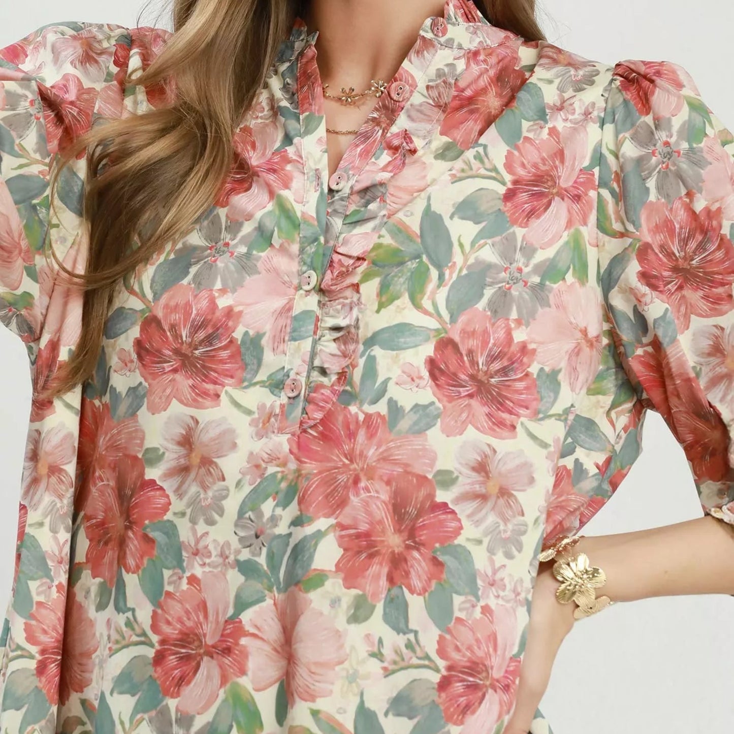 Texture shot of the unique multi print mixed floral pattern fabric on an Umgee dress from Solazura Boutique