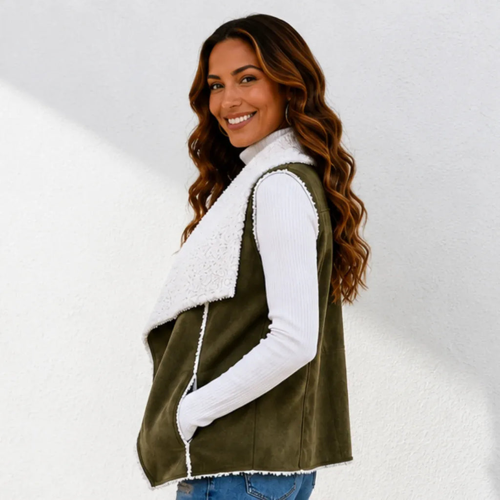Army green faux suede sherpa-lined vest showing side profile and sherpa trim