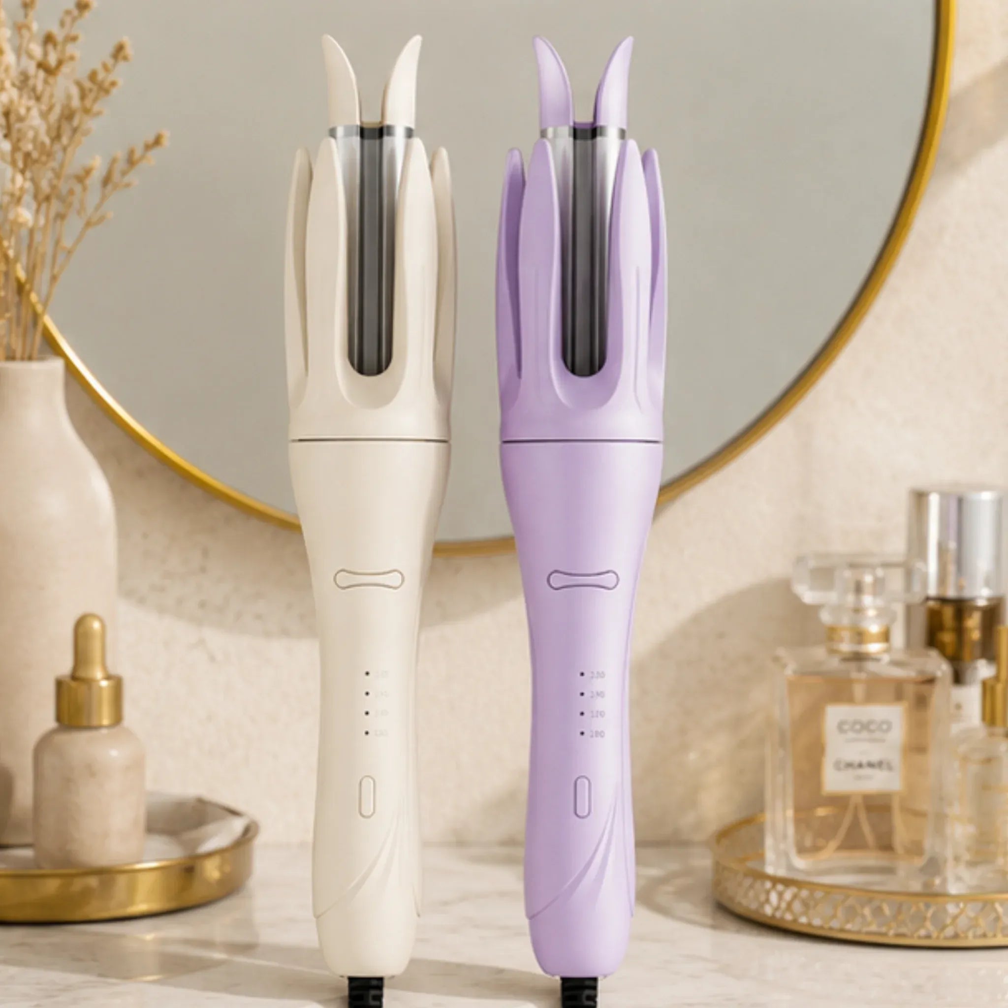 Automatic rotating curling iron available in ivory and lavender color options.
